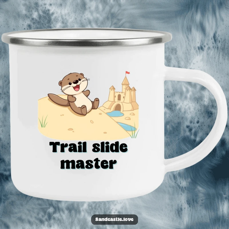 Funny camping mug showing a joyful otter character sliding down a sandy hill towards a sandcastle moat, ideal for enjoying drinks during outdoor adventures.