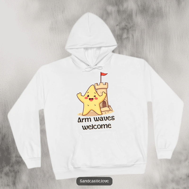 Hoodie showcasing a happy starfish character waving its arms near a sandy castle turret, perfect for beach lovers and ocean enthusiasts.
