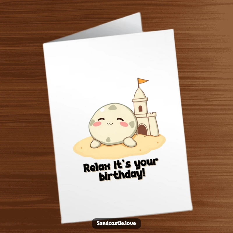Funny Free Printable Birthday Card: A contented sand dollar rests peacefully beside a sandcastle on warm sand.