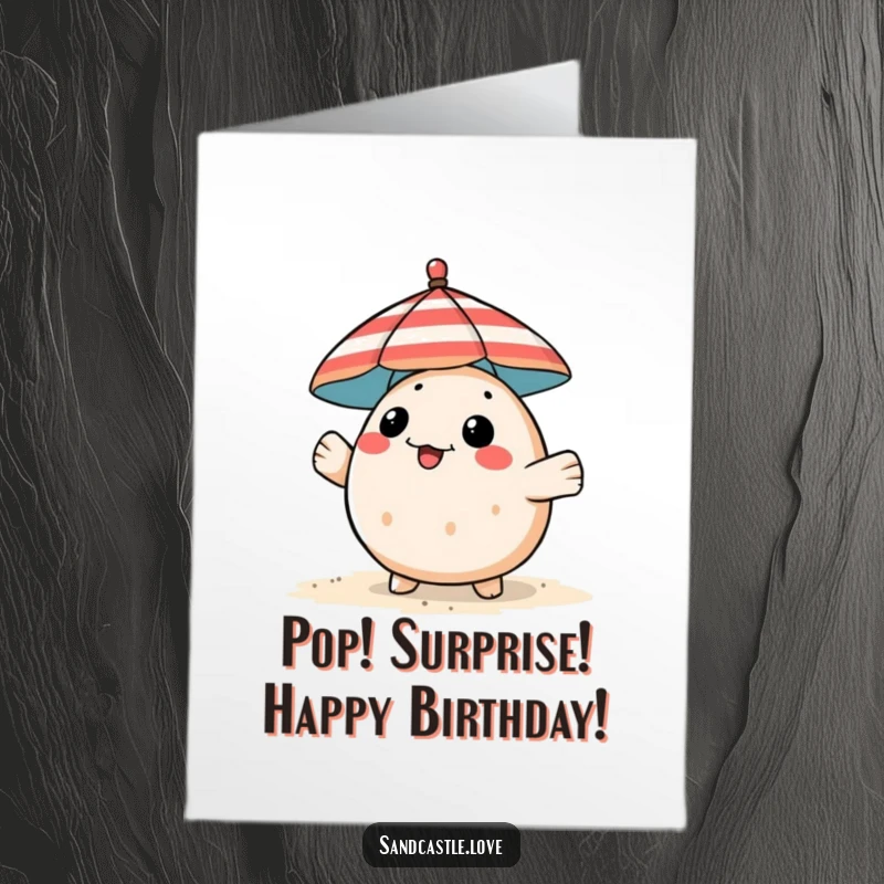Funny Free Printable Birthday Card: A playful pufferfish peeks out from behind a striped beach umbrella.