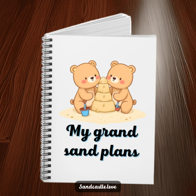 Funny notebook cover with two cute bears using tiny shovels and buckets to construct a tall sandcastle, symbolizing creativity and beach fun.