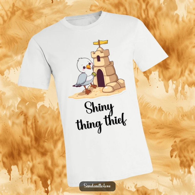 Funny seagull t-shirt, a sneaky seagull pilfering a shiny treasure from a sandcastle, beach humor gift.